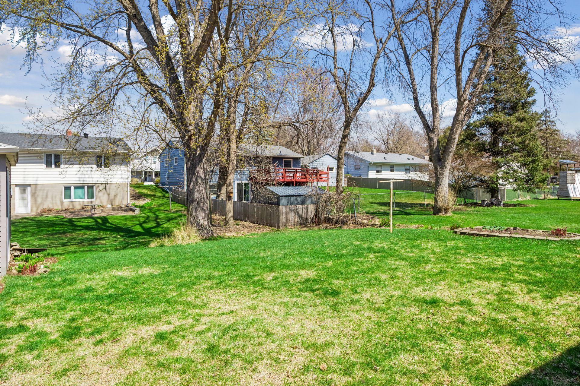 Generous green space with endless possibilities for outdoor enjoyment.