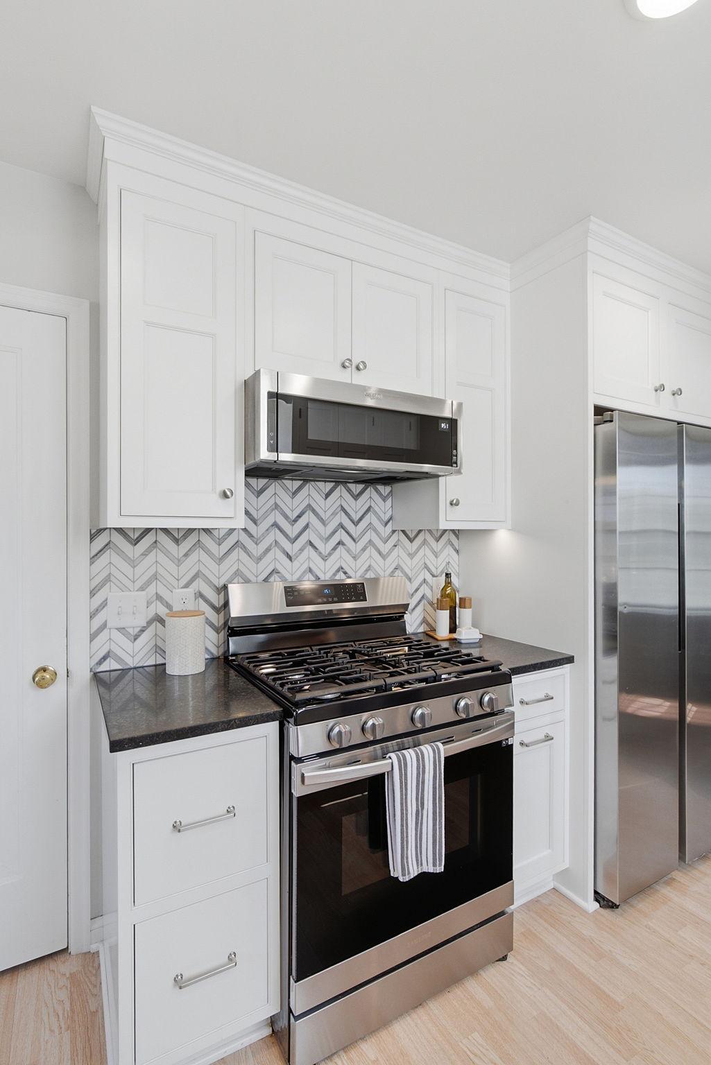 Nice appliances and backsplash.