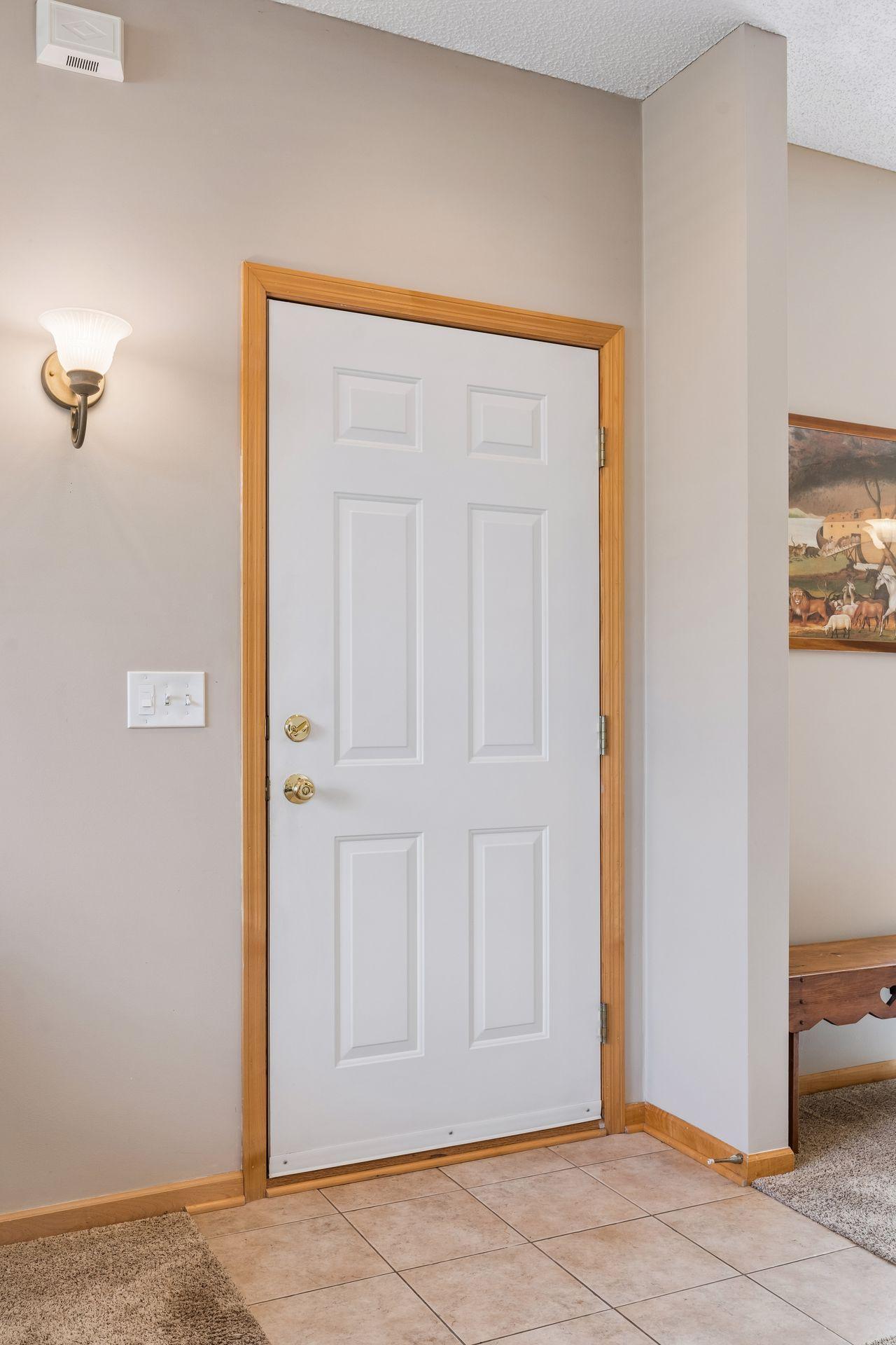 Convenient tile foyer entrance for easy clean up.