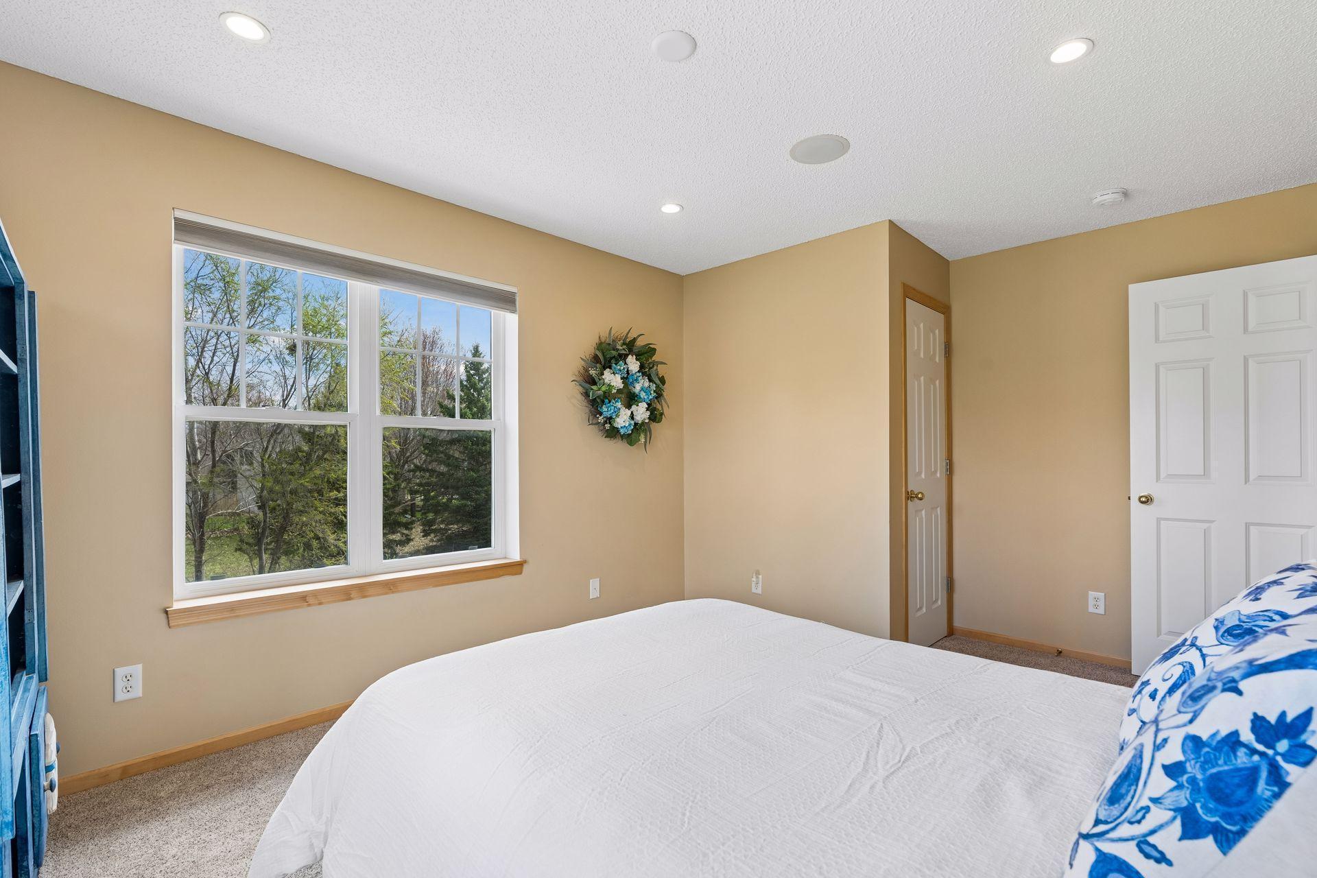 Second view of bedroom #2 which also has a rough-in for a future ceiling fan.