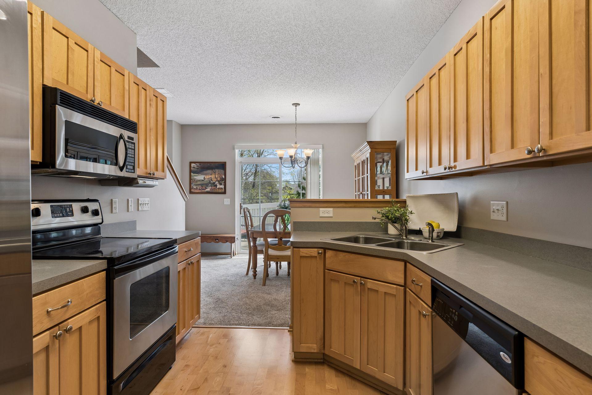 Tons of gorgeous raised panel cabinetry, plus a pantry closet.