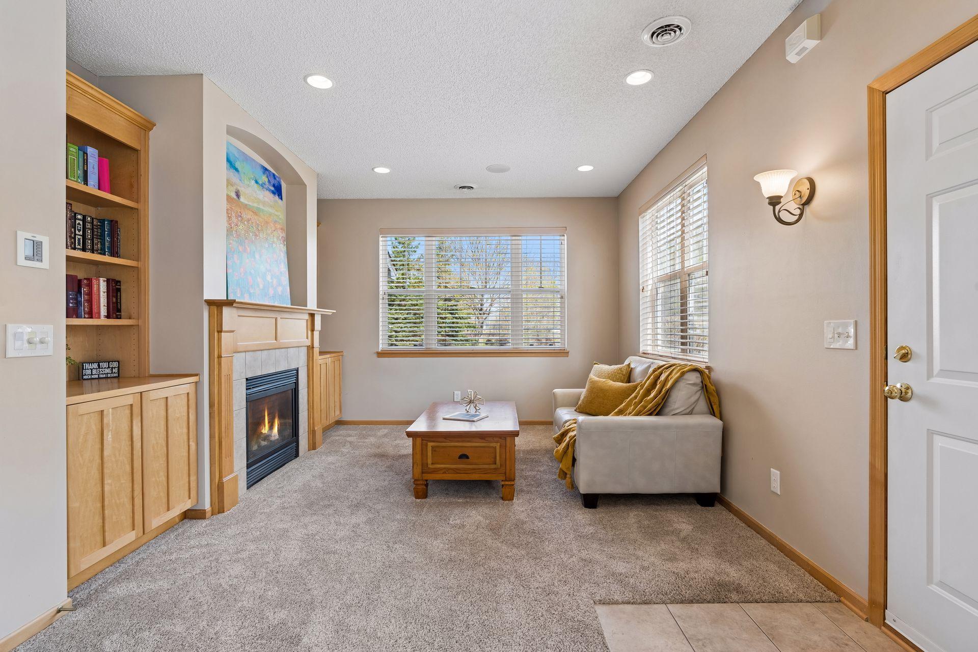 Gorgeous living room with upgraded Maple cabinetry and millwork.