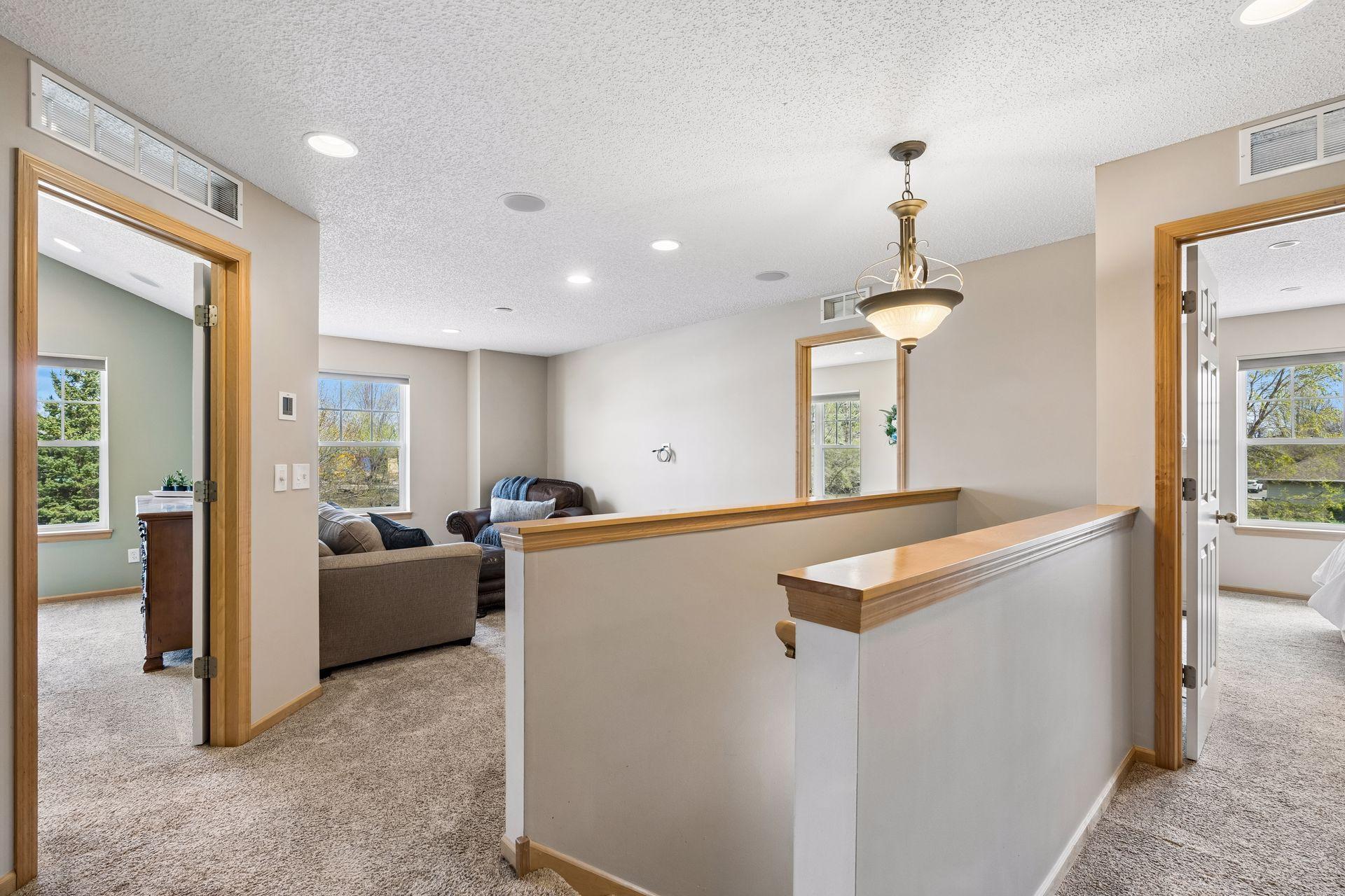 Fabulous loft area that welcomes flexible space for a second living room or in-home office.