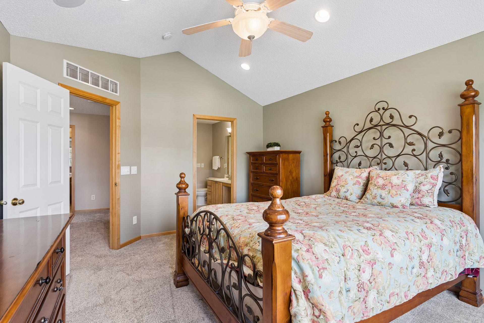 Primary suite with recessed lighting and built-in speakers for surround sound.