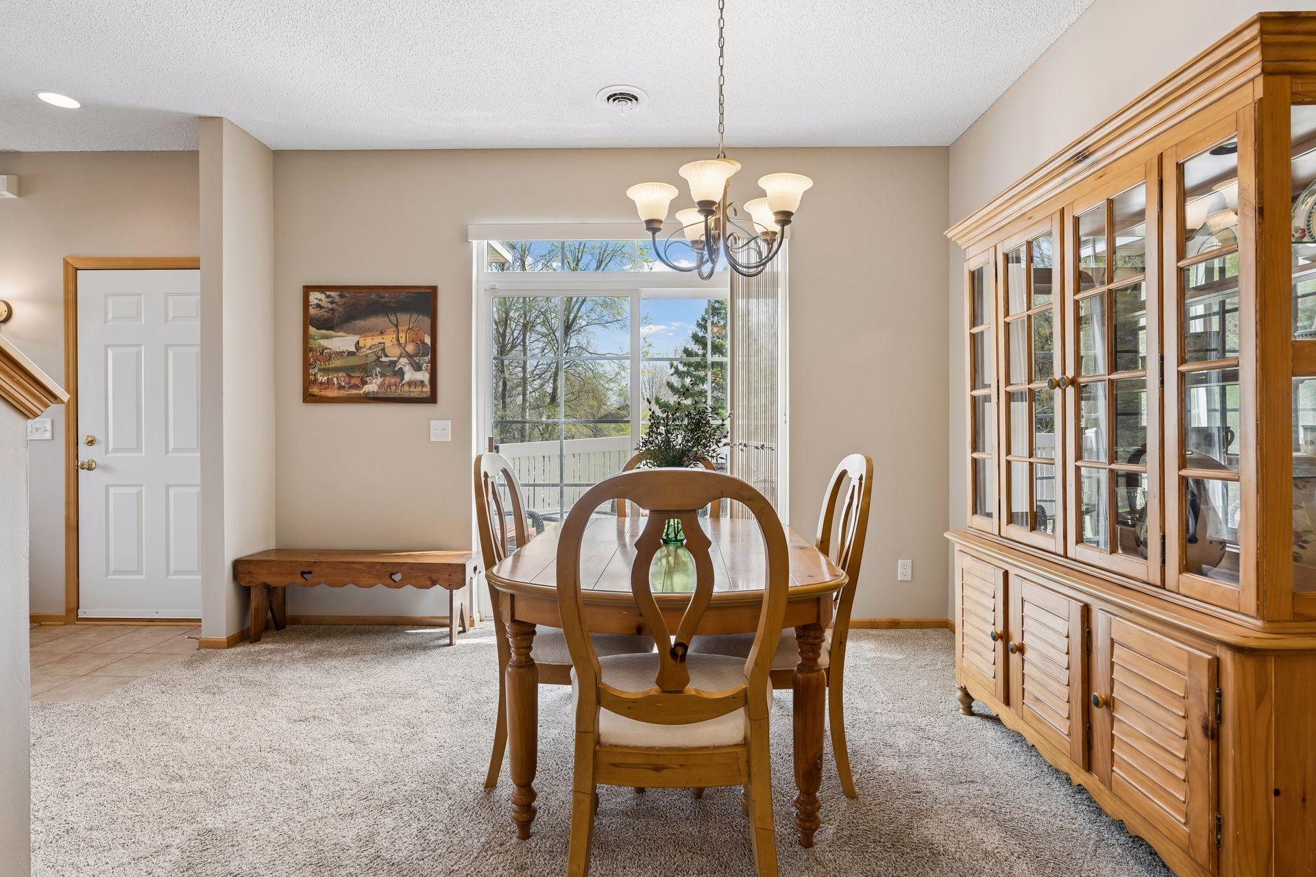 The semi-formal dining room offers excellent wall space for furniture or artwork.