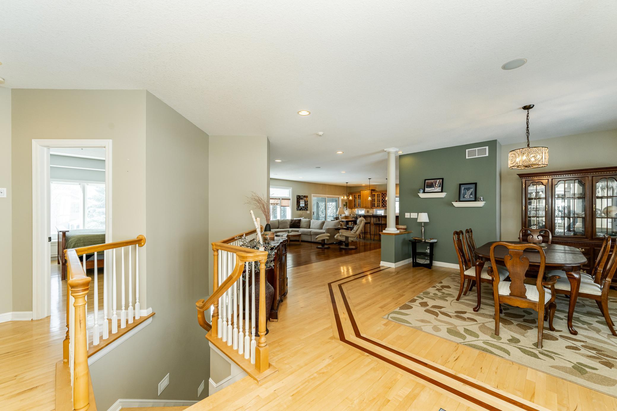View from front door toward formal dining room, living room, and kitchen