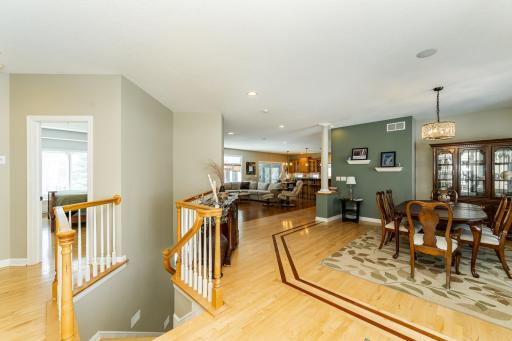 View from front door toward formal dining room, living room, and kitchen