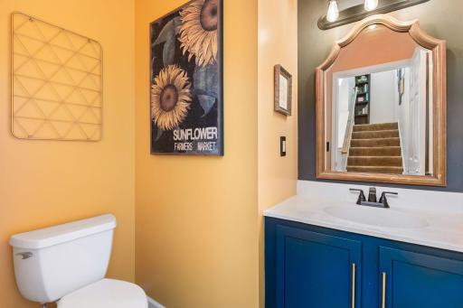 Main floor half-bath is bright and tastefully decorated!