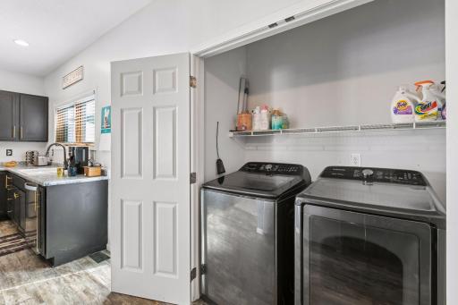 You will appreciate the side-by-side, Full-size washer and dryer! No undersized, stacked units here!