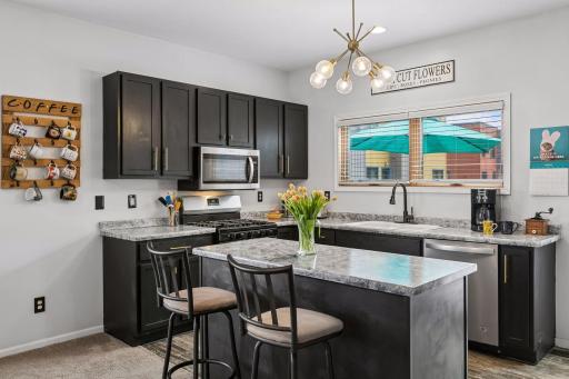 Room for seating at the island! Perfect for a cup of joe and a quick breakfast, or a perch for visiting guests!