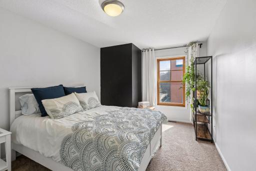 Bedroom one, at the top of the stairs, is nicely appointed! East facing window.