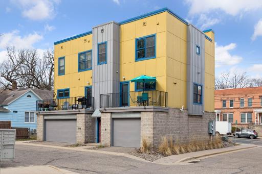 Corner, end-unit with tandem two-stall garage, and additional guest parking close by!