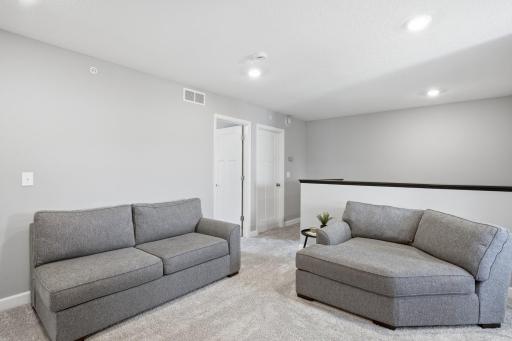 Upstairs you will find 3 spacious bedrooms with ample storage, 2 bathrooms as well as the large laundry/utility room.