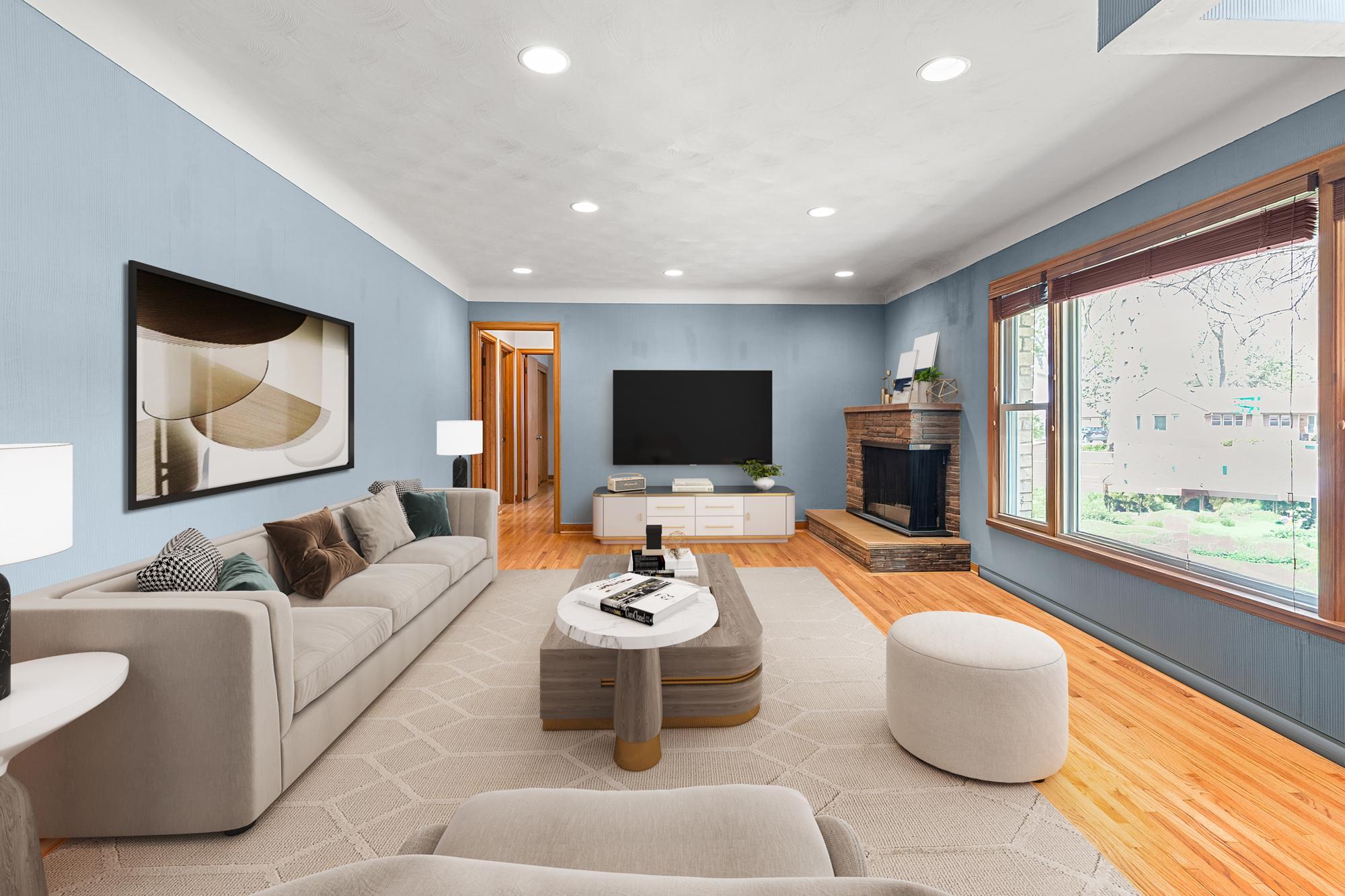 As you enter the home, you are greeted by the beautiful original wood floors and a very large family room. Look at that the light that comes in from the large picture window. This has been virtually staged