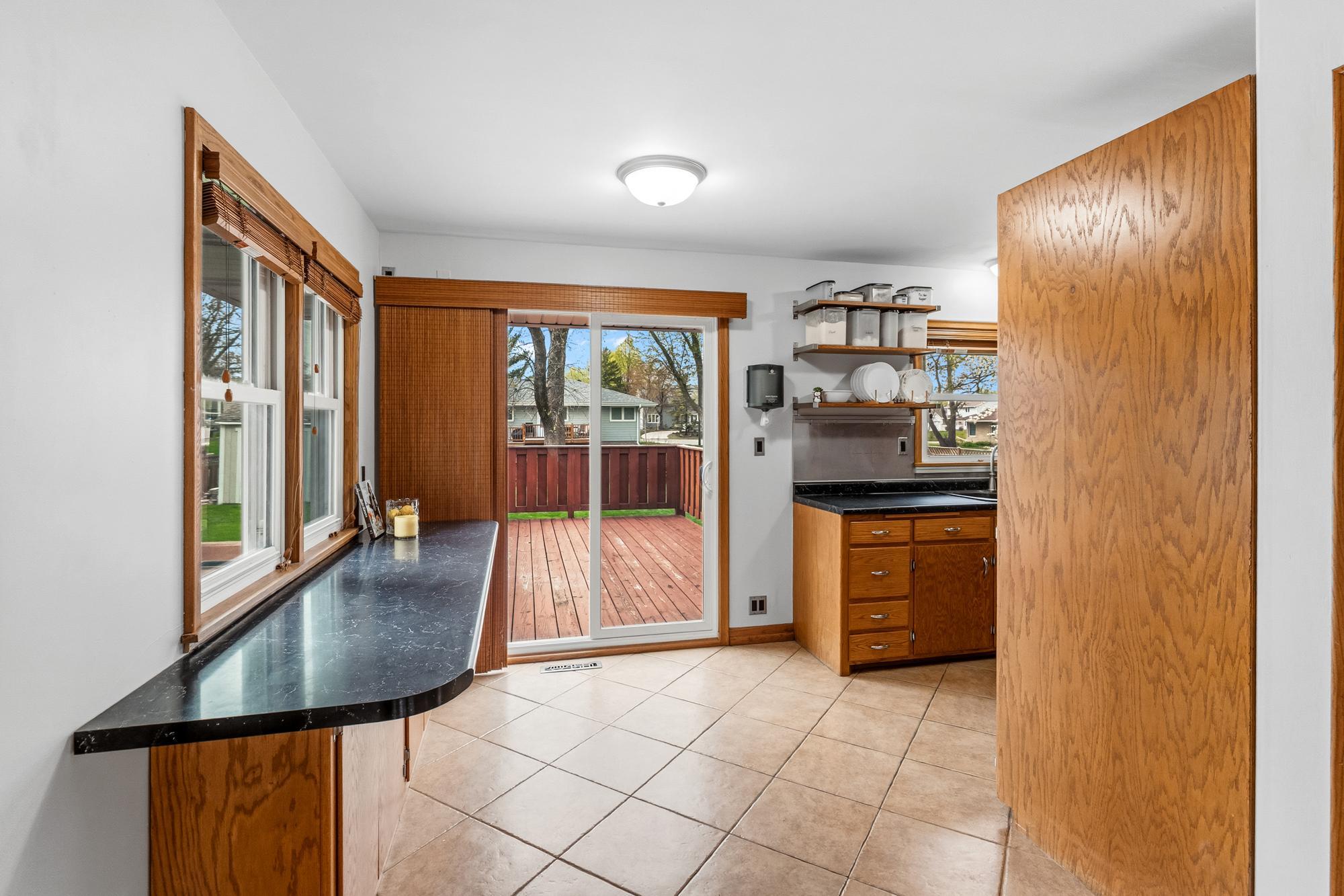 Enjoy amble prep or workspace with this build in counter space in the eat-in kitchen/breakfast bar area.