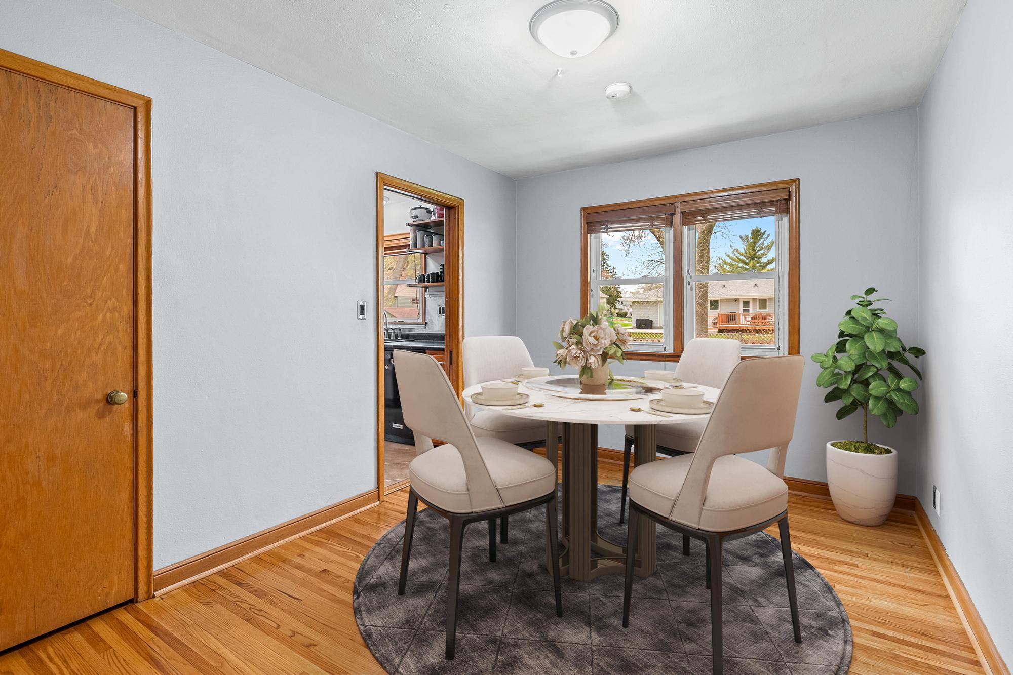 Bedroom #1 on the main level has been staged as a dining room but could easily be used as a bedroom, office or sitting room.