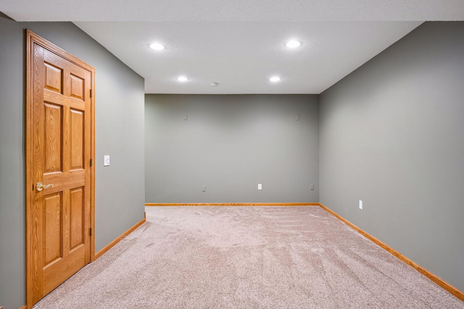 Another view of a section of the amusement room. Closet is for storage under the stairs.