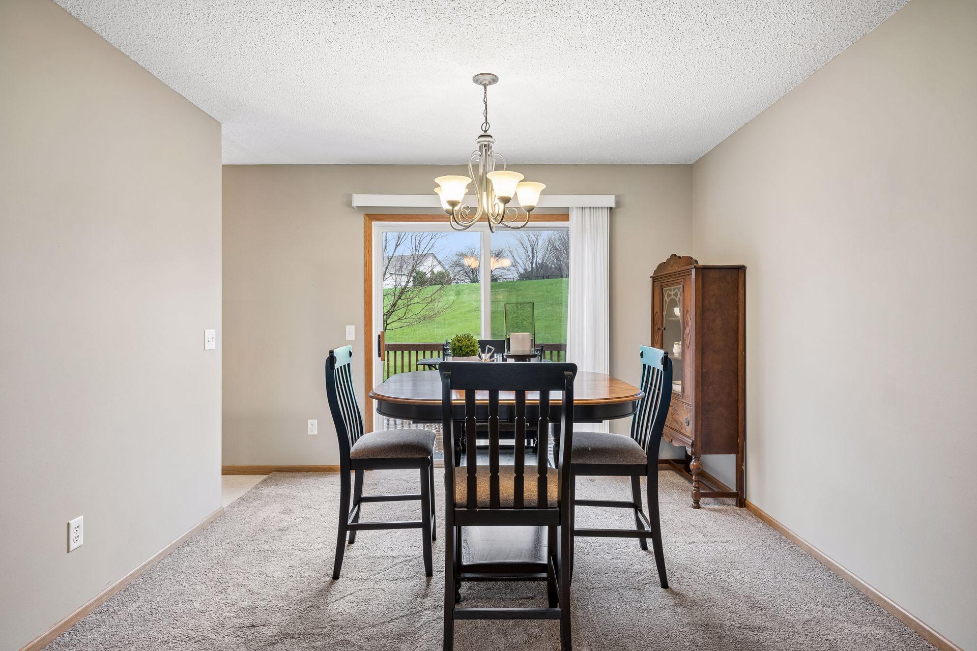 Dining room size accommodates a larger table. Access to the expansive deck.