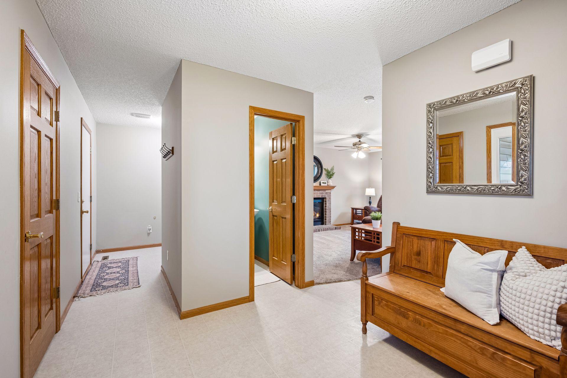 Down the hall to the laundry area, doorway to 1/2 bath