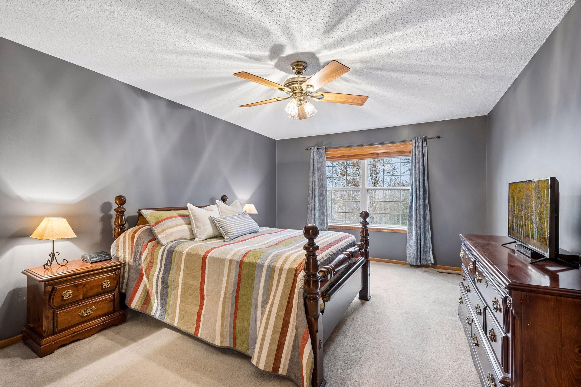 Primary suite includes a walk in closet and full bathroom