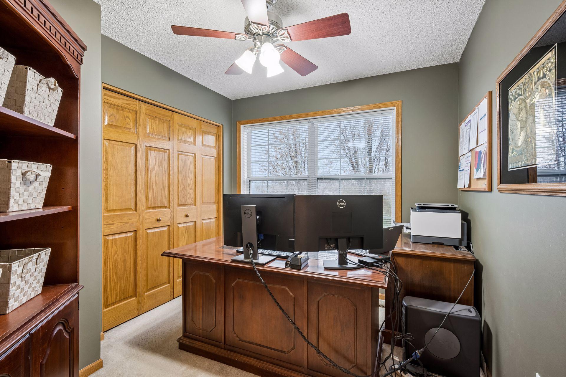 Bedroom #4 being used as an office - windows face front yard