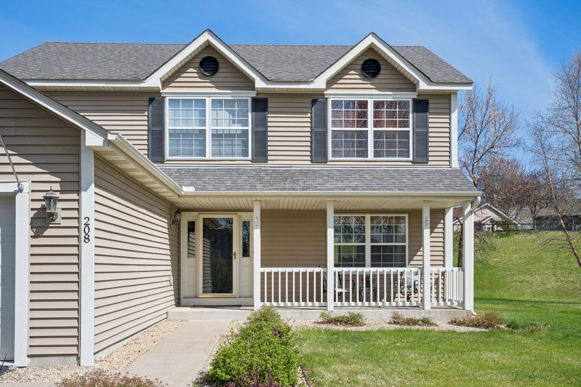 Charming front porch to enjoy your morning coffee or an evening beverage