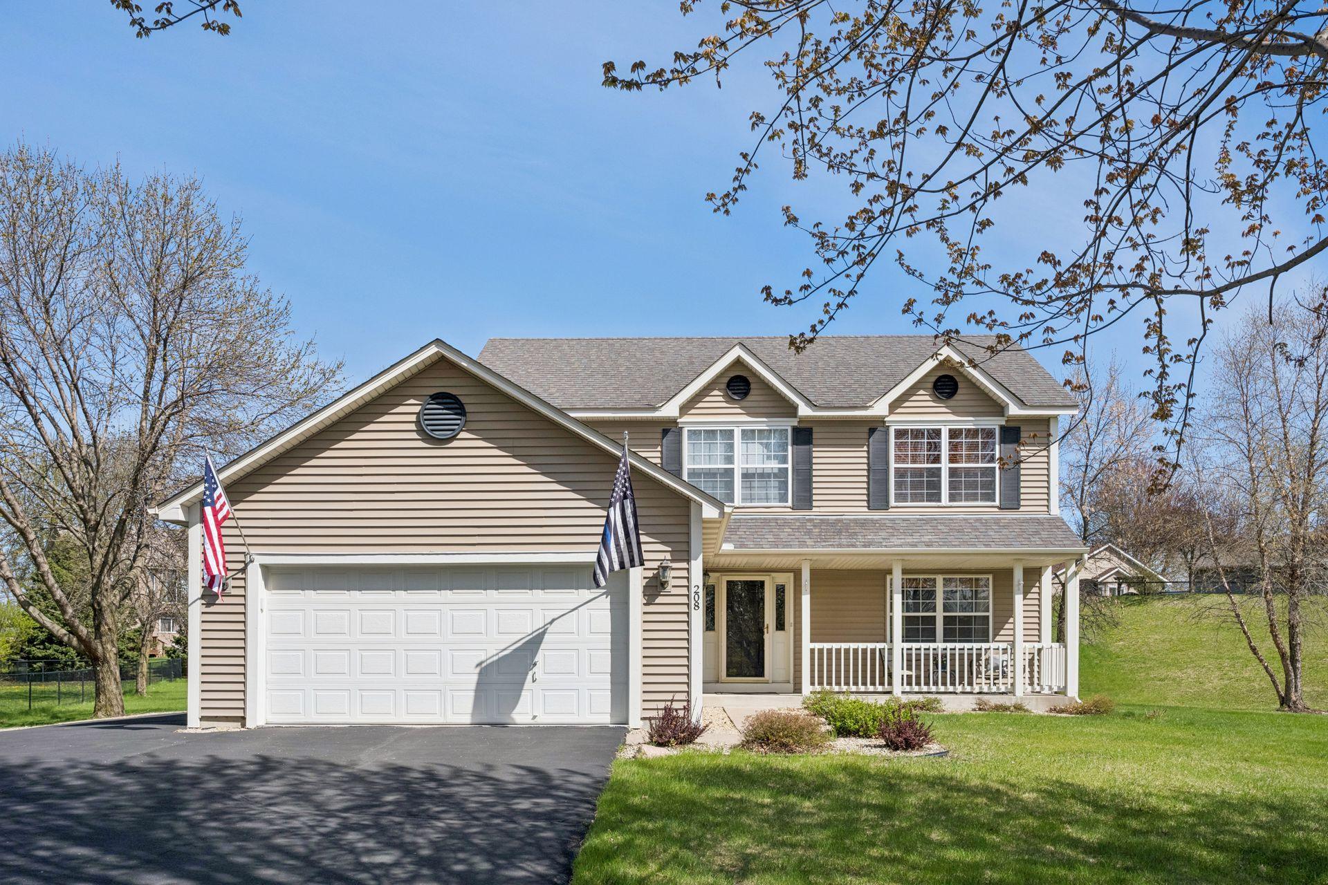 Welcome home to 208 Cherrywood Ave NW, St Michael. Additional parking area next to the garage.
