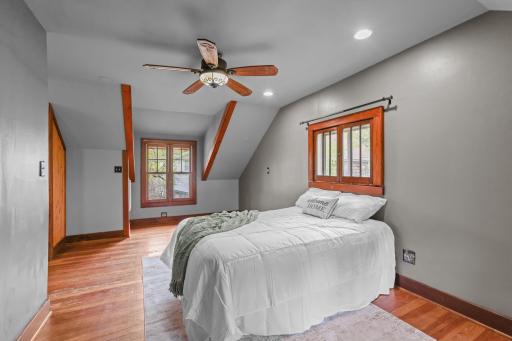Primary bedroom upstairs with ensuite bathroom
