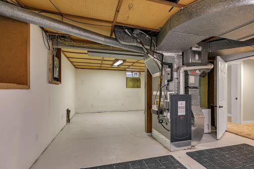 Mechanical Room with Abundant Storage. Note: Brand New Furnace