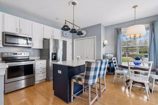 Functional and inviting kitchen with extensive counter space and a sizable island perfect for gathering.