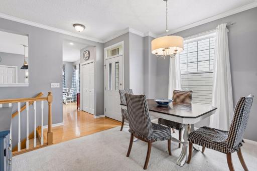 Inviting front entry with formal dining area, perfectly connected to the kitchen for everyday living and entertaining.