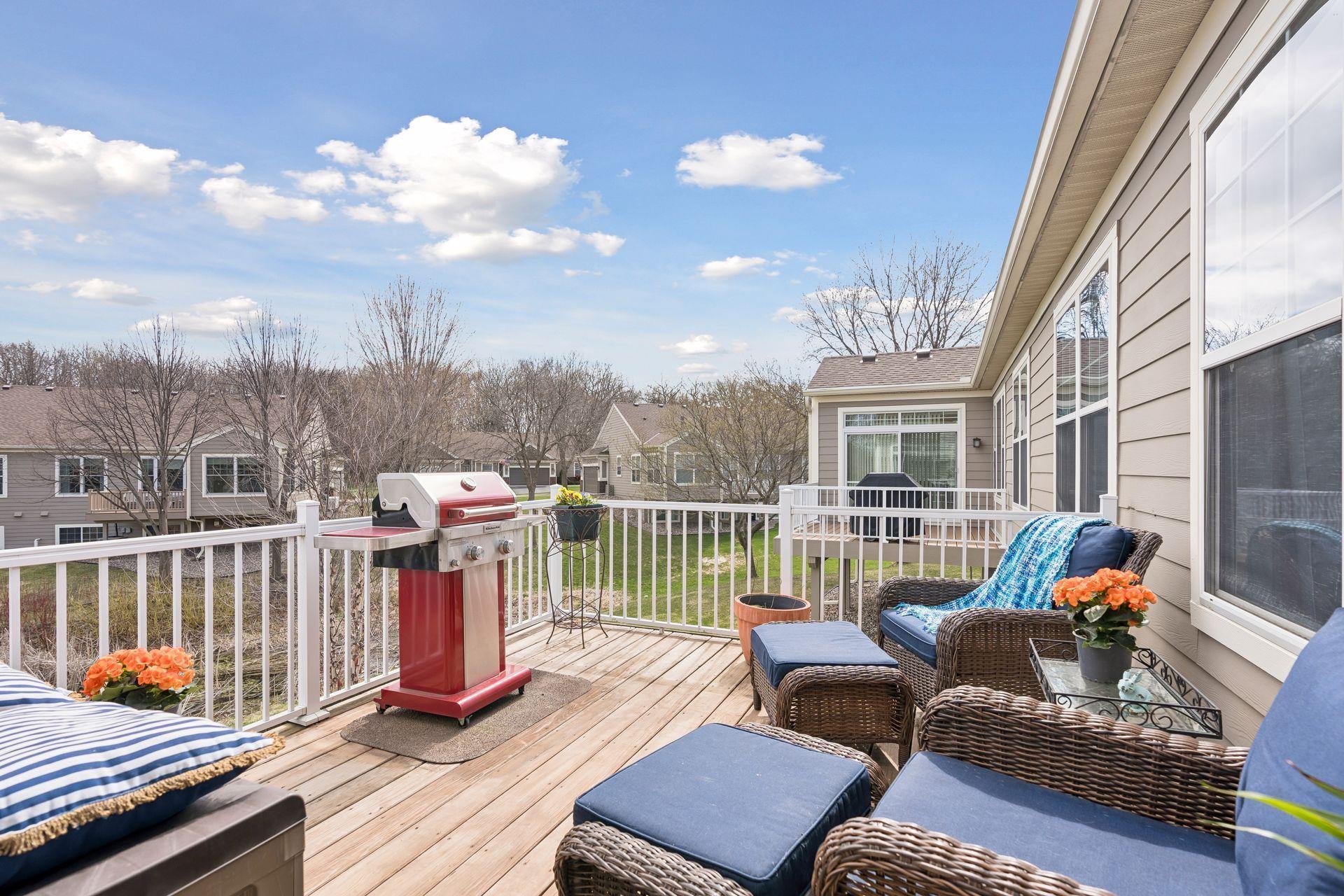 Expansive deck overlooking the pond, ideal for entertaining or quiet evenings outdoors.