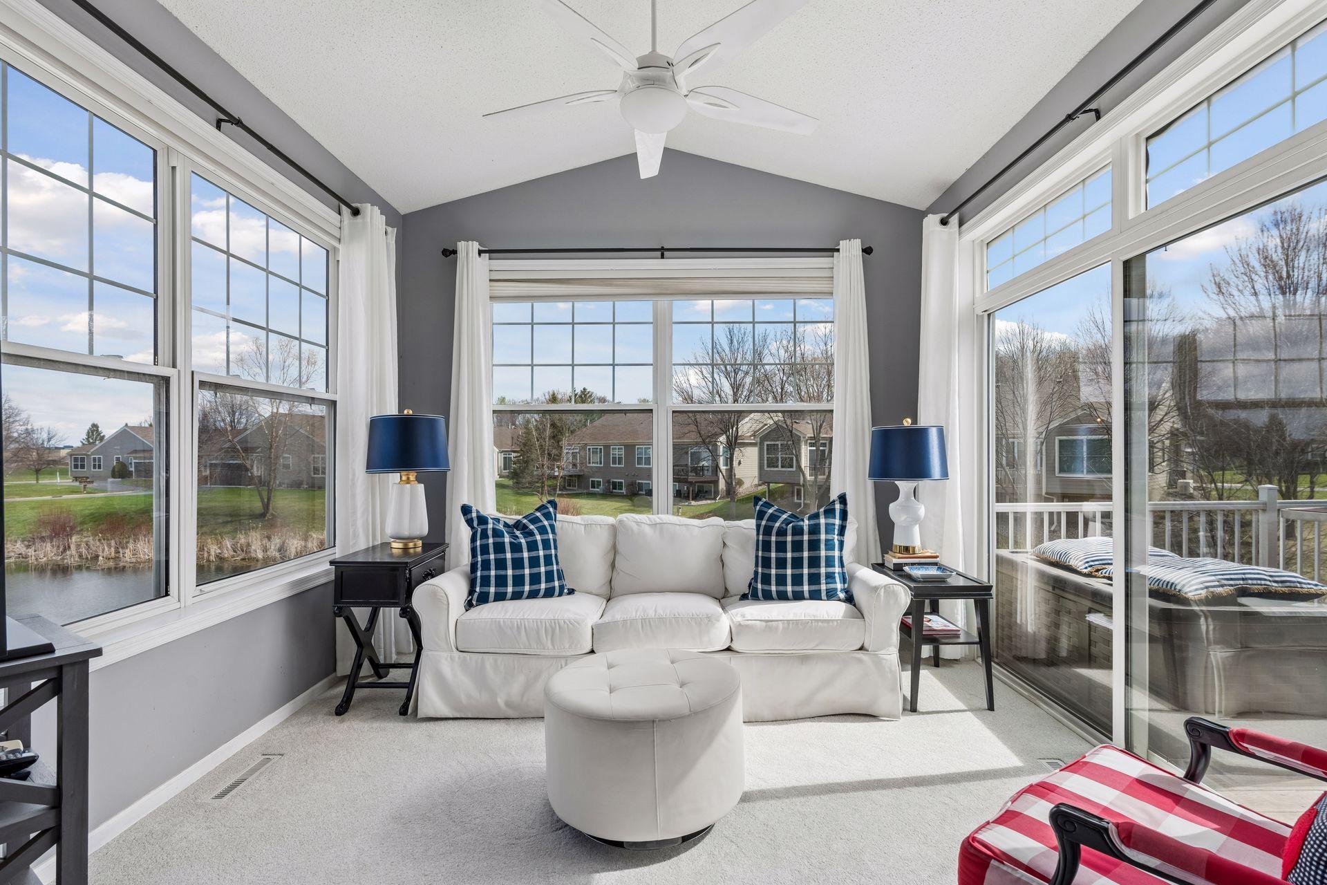 Enjoy peaceful pond views from the sun-filled four-season porch, with easy access to the spacious outdoor deck.