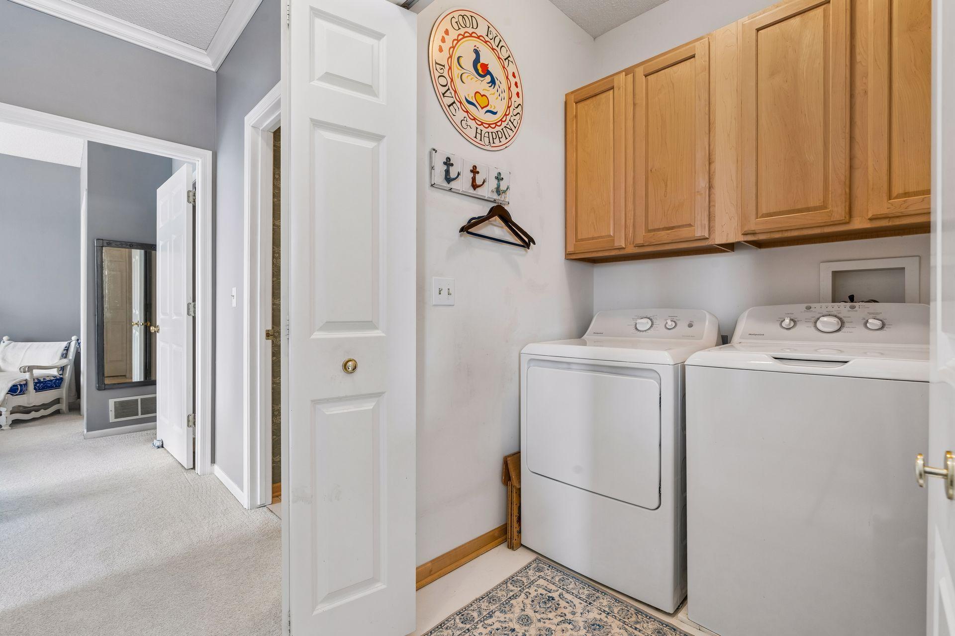 Main-level laundry thoughtfully placed near the primary suite for everyday ease.