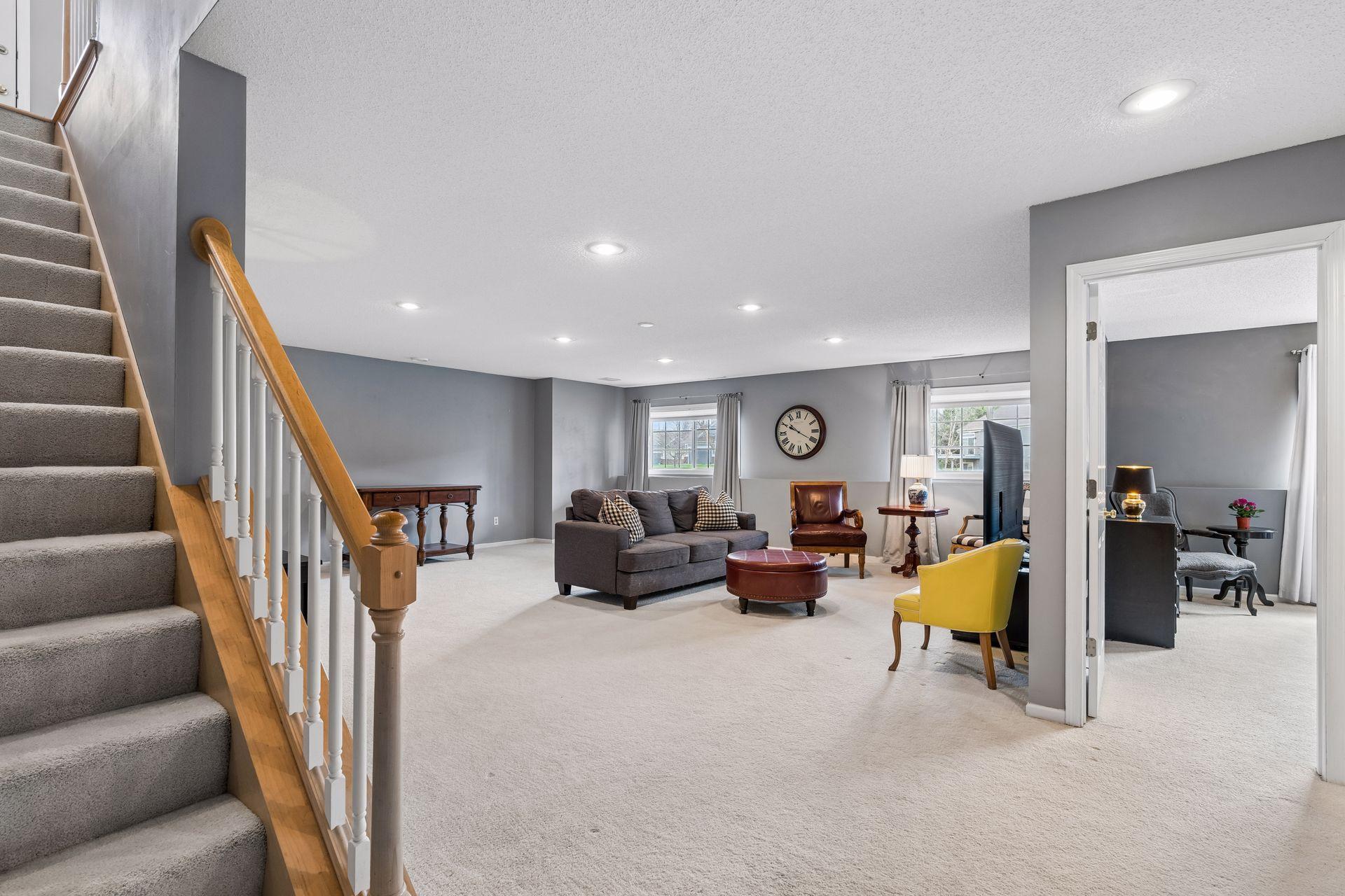 Bright and expansive lower level with lookout windows bringing in great natural light.