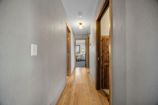 Hallway to the Main Floor Bedrooms and Bathroom