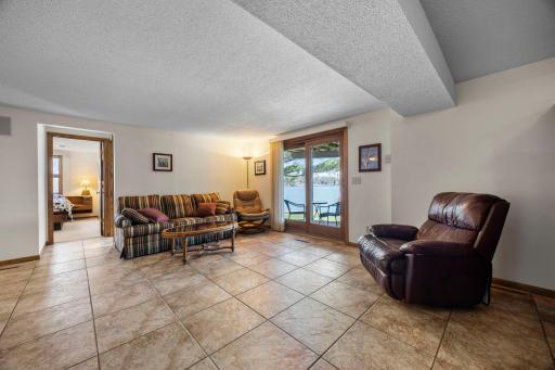 Lower Level Family Room with Doors Leading to the Lake