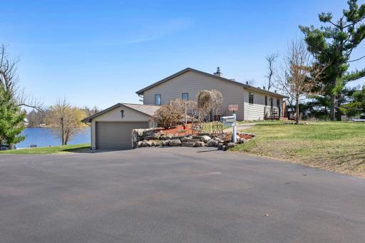 North Side of the Main House with Professional Landscaping Throughout the Property