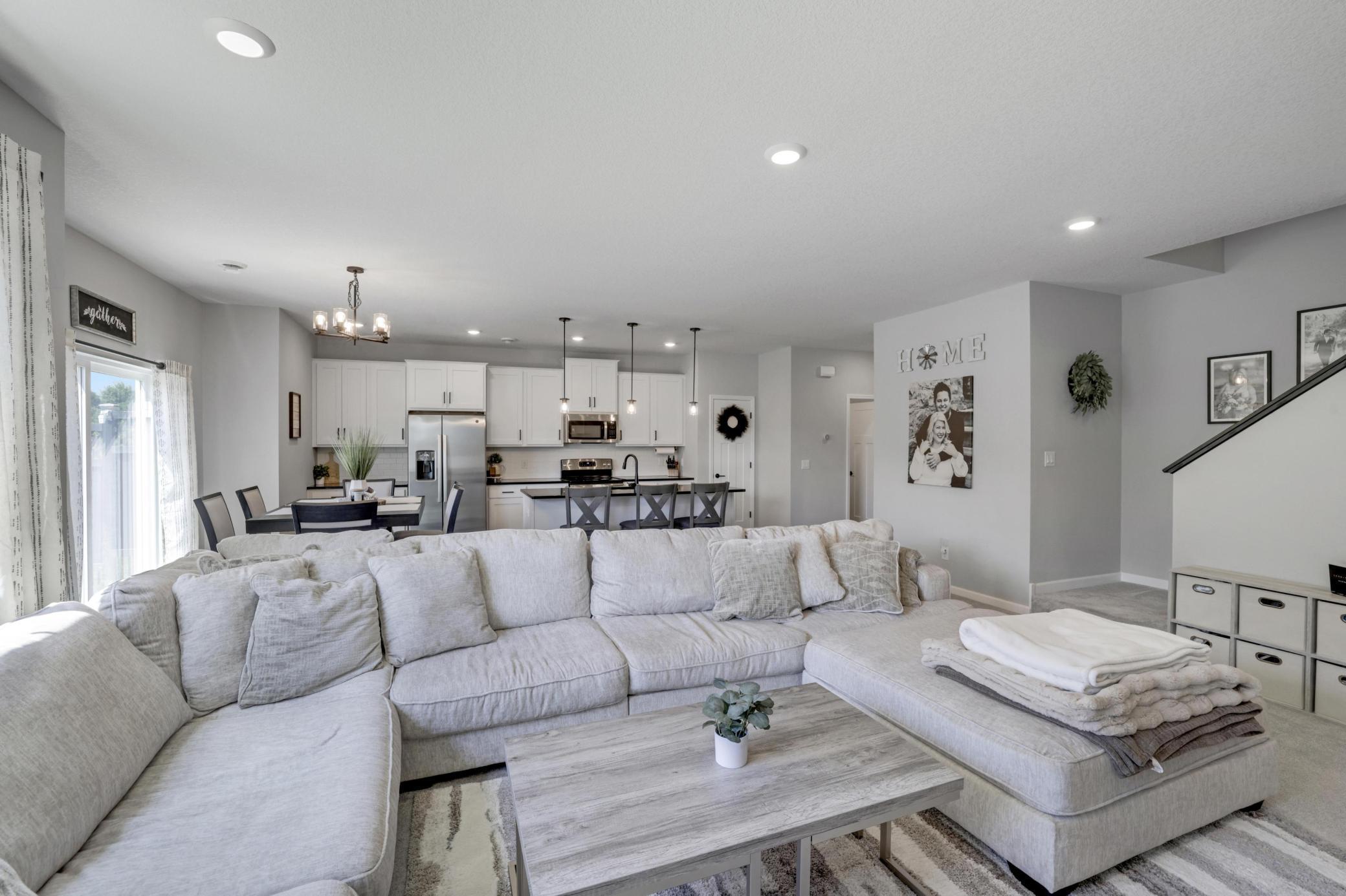 Another view of the great room, dining room and kitchen!