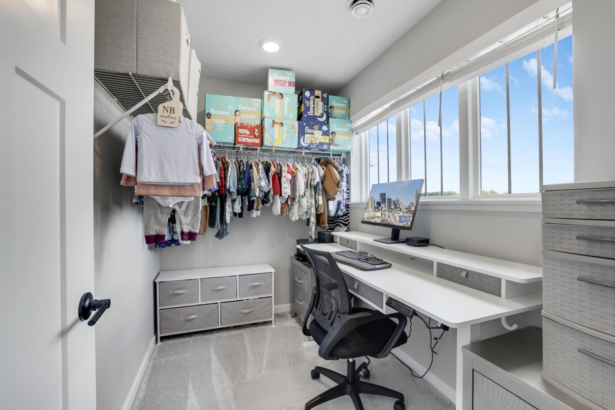 Huge walk in closet off upper level bedroom can be used for many things!