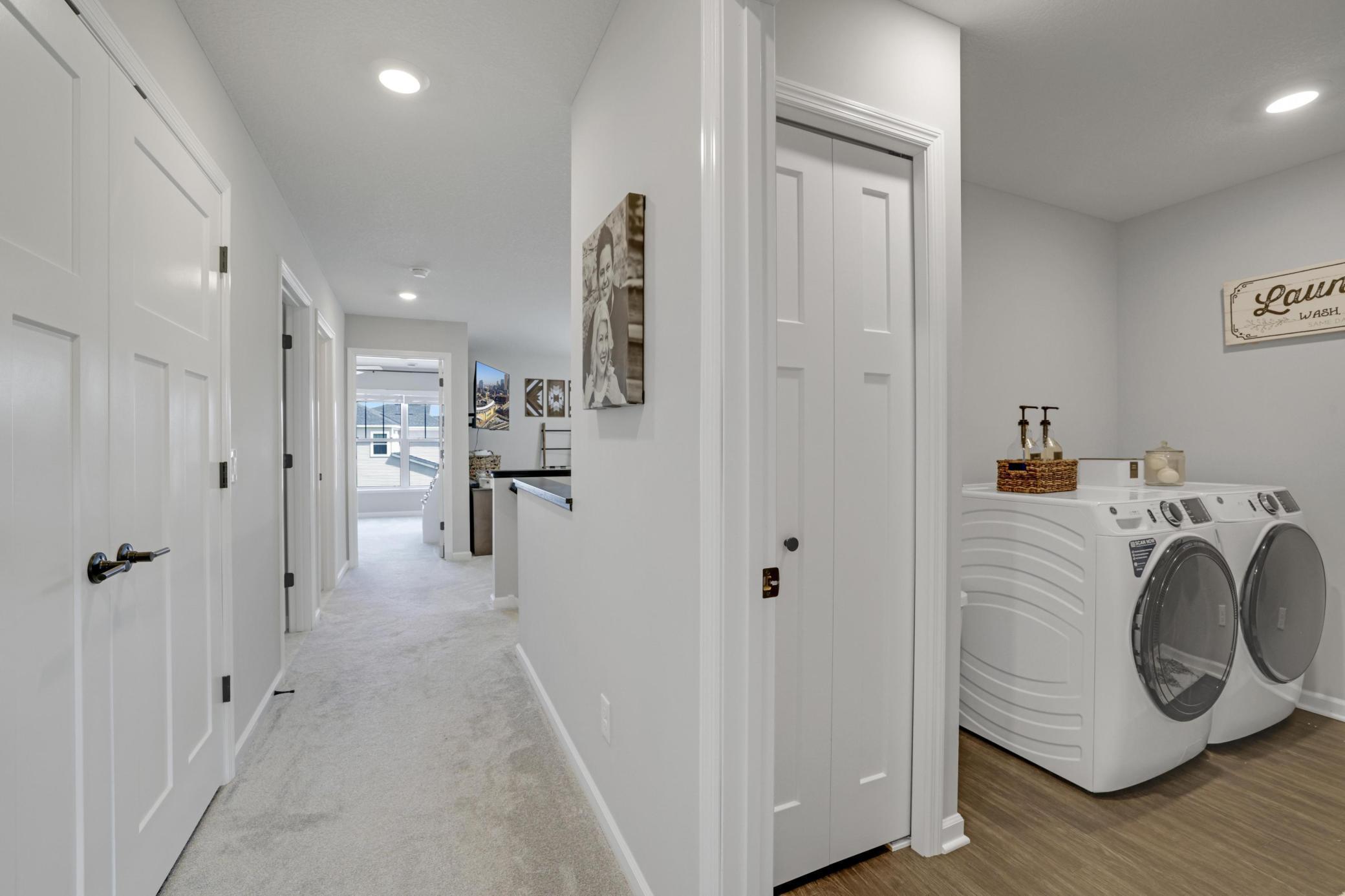 Convenient upper level laundry room.