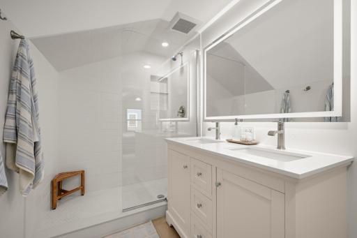 Upper level primary bath that was added by sellers that was tastefully designed