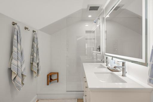Dual sink vanity with quartz top and lighted mirror