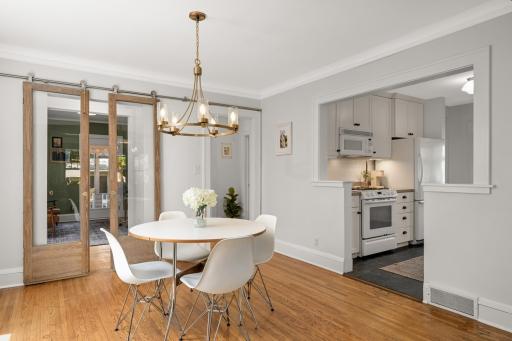 Original hardwood floors in dining room and wonderful open floor plan