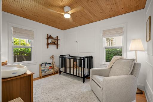 Second main floor bedroom wall detailing and wood accent on ceiling