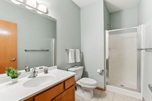 Primary 3/4 bath offering a functional and well-appointed layout