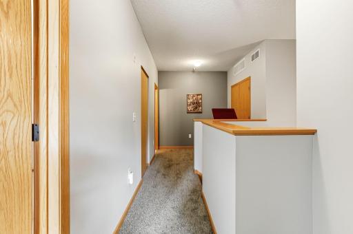 New carpet in the upper level adds a fresh, clean feel throughout the space, offering soft comfort underfoot and a modern, move-in-ready finish.