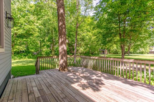 Enjoy peaceful backyard views and exceptional privacy from this spacious outdoor living space.