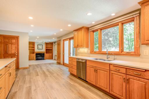The kitchen seamlessly connects to the adjoining living spaces, creating an open and functional layout filled with natural light.