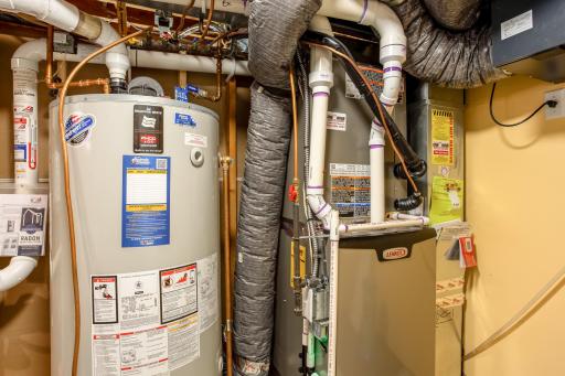 Updated mechanical systems, including the furnace and water heater, reflect the home's commitment to comfort, reliability, and long-term peace of mind.